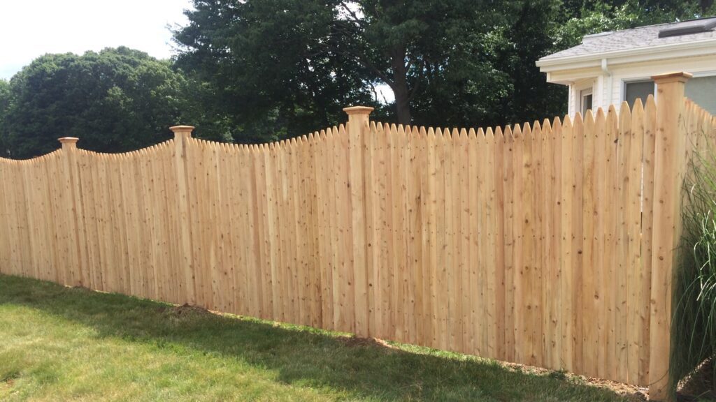 Curved Wooden Picket Fence With Decorative Posts - Best Fencing Contractors Rockville CT