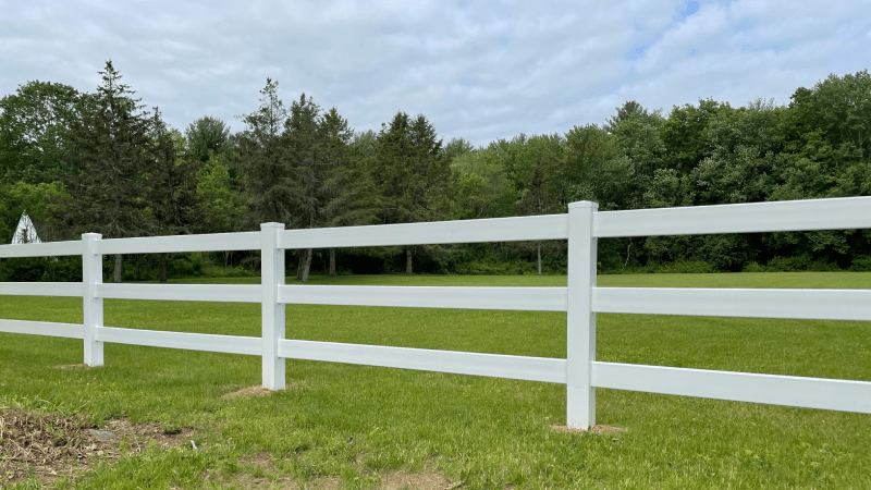 White Wooden Picket Fence With Multiple Horizontal Rails